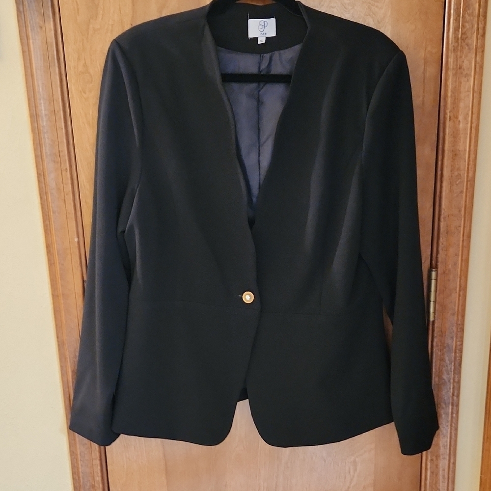 Elegant Black Blazer by [Brand]
